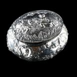 A Continental 800 silver dressing table box, relief embossed putti and floral decoration, maker's