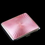 An Art Deco George V silver and pink enamel cigarette case, rectangular form with engine turned