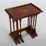 A nest of 3 walnut occasional tables, with inlaid musical marquetry designs, largest width 56cm