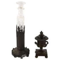 A long Victorian cut-glass perfume bottle in original patinated bronze stand, height 27cm, and a