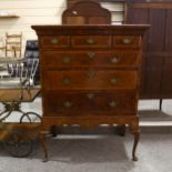 George III walnut chest on stand, with 3 short and 3 long cross-banded drawers, on cabriole legs,