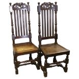 A pair of 19th century oak carved and turned oak chairs, height 117cm Break repair to top-rail of