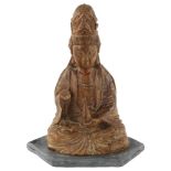 An Antique Oriental carved wood Buddha, on later slate base, height 26cm 1 hand is missing,