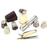 A collection 5 thimbles (2 silver), bone barrel-shaped needle case and another silver needle case