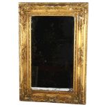 A Victorian gilt-gesso framed wall mirror of small size, overall 50cm x 34cm Mirror glass is