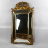 19th century carved wood and gesso-framed wall mirror, with bevel mirror inset surround, height