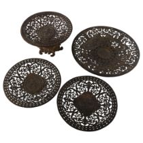 A set of 4 Victorian Coalbrookdale cast-iron dishes, with relief cast and pierced decoration,