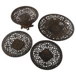 A set of 4 Victorian Coalbrookdale cast-iron dishes, with relief cast and pierced decoration,