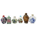 A group of Chinese porcelain and glass snuff bottles