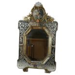 A large ornate Venetian Murano glass wall mirror, with amber glass floral mounts and heraldic lion