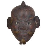 A Chinese carved and lacquered wood mask sculpture, height 16cm, mounted in glazed box frame Small