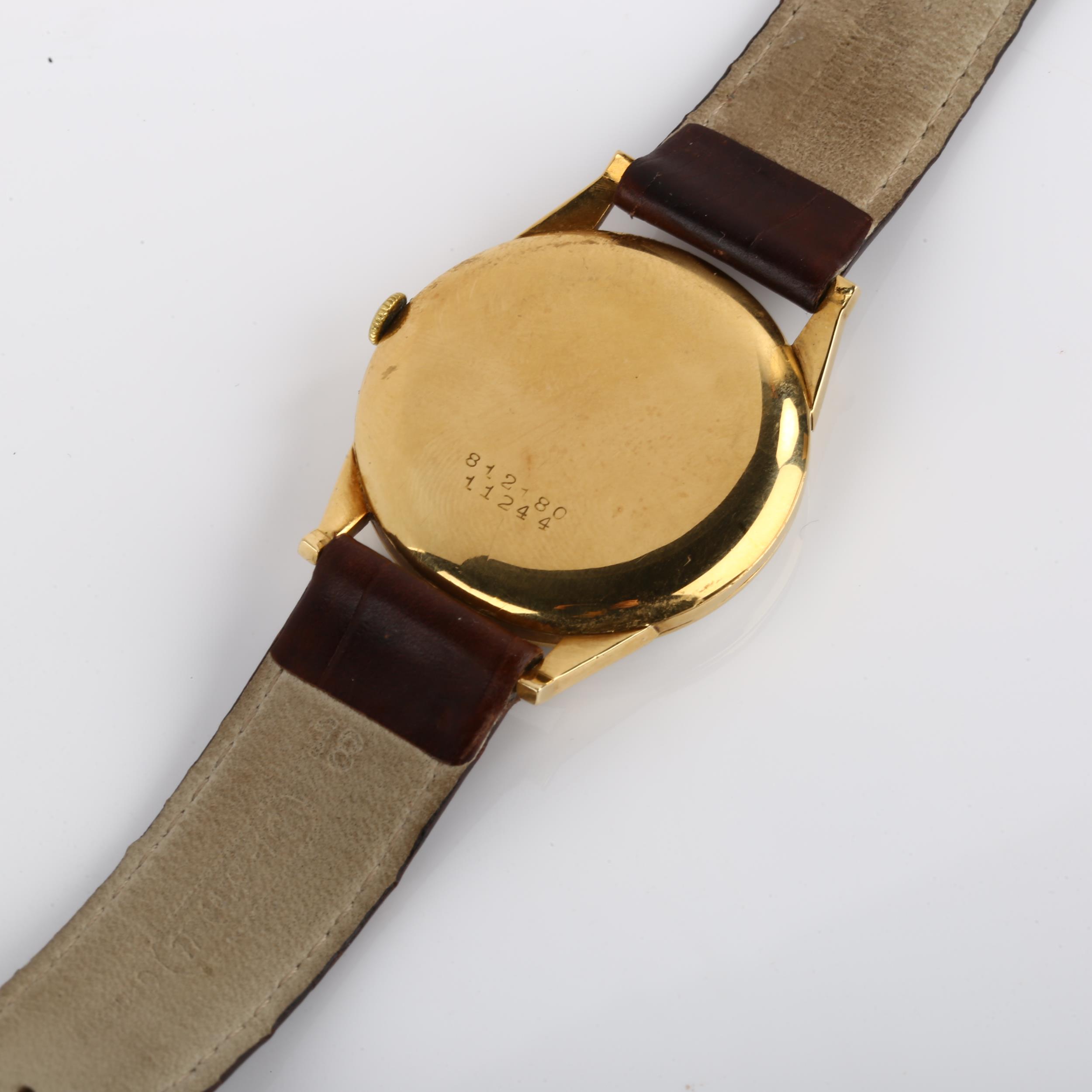 UNIVERSAL GENEVE - an 18ct gold mechanical wristwatch, ref. 11244, circa 1956, silvered dial with - Image 4 of 5