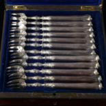 A cased set of 12 French silver oyster forks, maker's marks BF possibly Bion Henri and Fremines