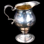 A George III silver helmet cream jug, indistinct maker's marks, hallmarks London 1781, height