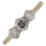 An 18ct gold three stone diamond ring, platinum-topped with modern round brilliant-cut diamonds,