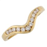 An 18ct gold diamond wishbone ring, channel set with modern round brilliant-cut diamonds, setting