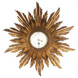 A French giltwood 30-hour sunburst wall clock, white enamel dial with Arabic numerals, overall