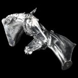 A pair of Elizabeth II silver filled horsehead bookends, by Camelot Silverware, hallmarks