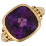 An 18ct gold amethyst dress ring, maker's marks JCR, setting height 13.5mm, size L, 10.2g No