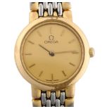 OMEGA - a lady's gold plated stainless steel De Ville quartz bracelet watch, champagne dial with