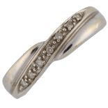 A modern 9ct white gold diamond crossover ring, set with modern round brilliant-cut diamonds,