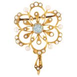 An Art Nouveau aquamarine and pearl openwork flowerhead pendant/brooch, pendant height 41.1mm, 5.