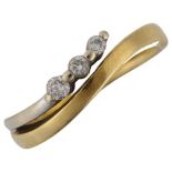 An 18ct two-colour gold three stone diamond band ring, set with modern round brilliant-cut diamonds,