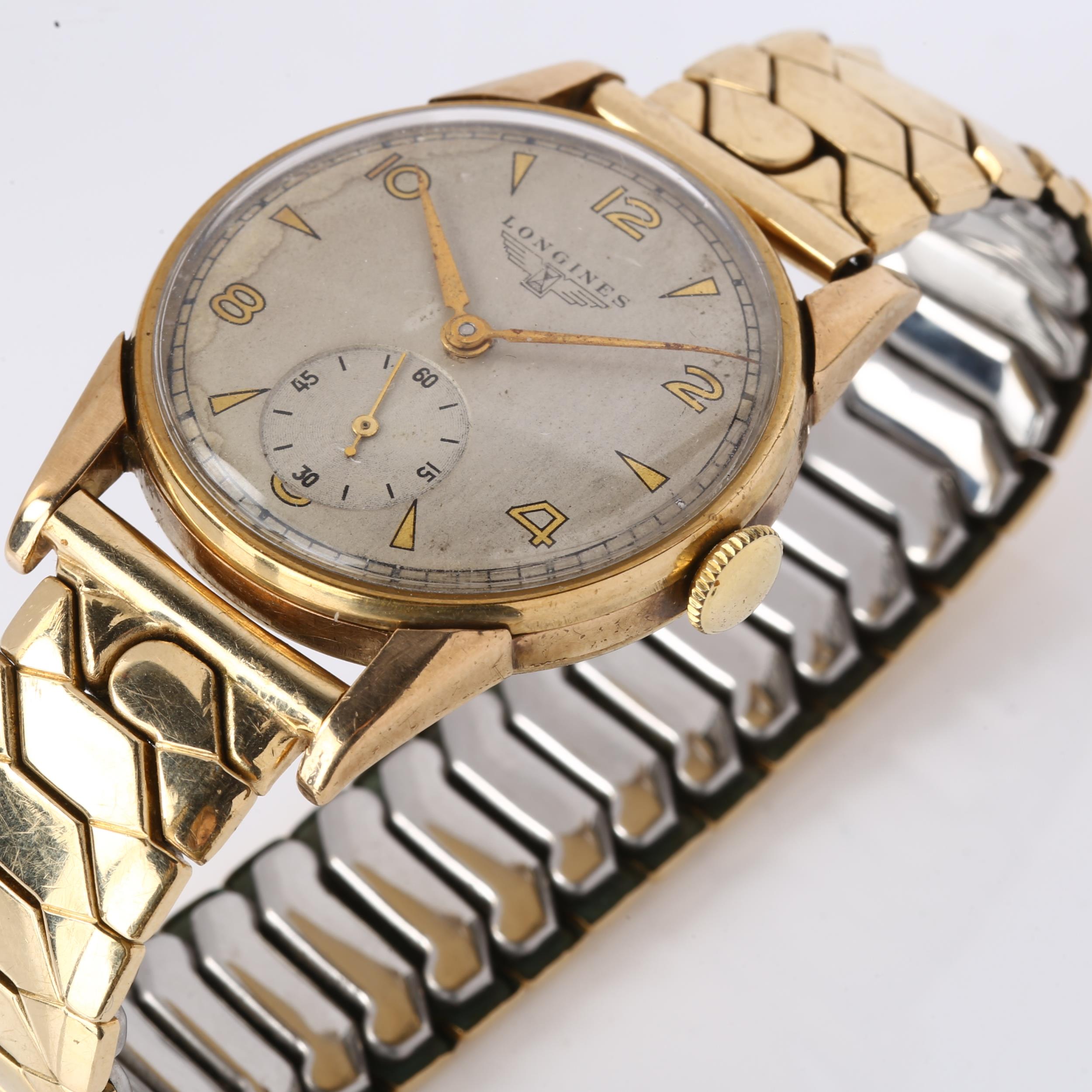 LONGINES - a mid-20th century 9ct gold mechanical bracelet watch, ref. 17702, circa 1948, silvered - Image 3 of 4