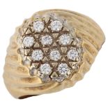 A large 9ct gold cubic zirconia signet ring, with fluted shoulders, setting height 15.9mm, size S,
