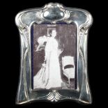 An Elizabeth II silver-fronted strut photo frame, in Art Nouveau style, by Carr's, hallmarks