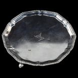 A George III silver salver, circular-shaped form with gadrooned rim, by John Crouch and Thomas