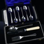 A cased set of silver feather-edge teaspoons and a cased silver christening set (2) Lot sold as seen
