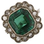 An 18ct white gold green tourmaline and diamond cluster ring, set with octagonal step-cut tourmaline
