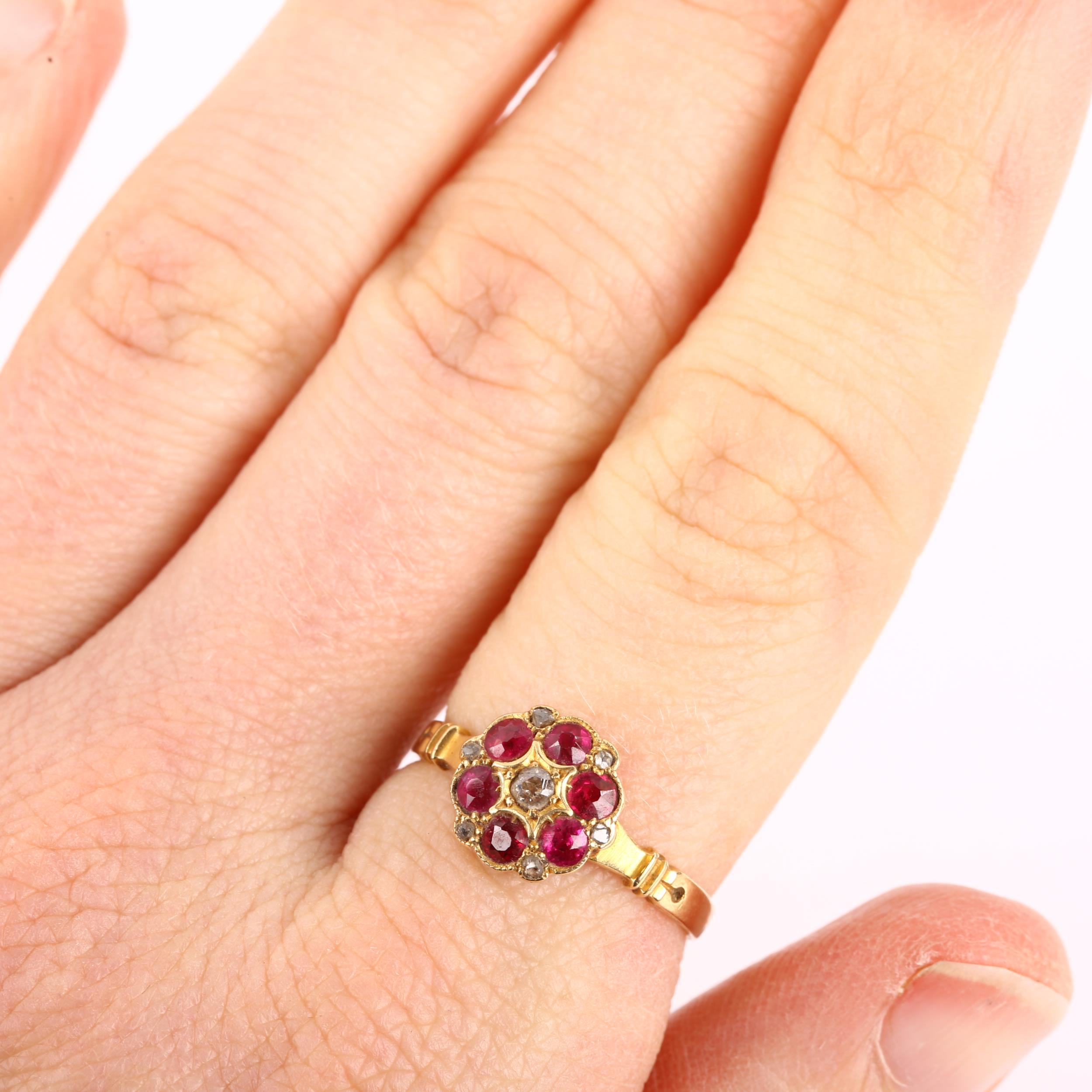An Antique 18ct gold ruby and diamond cluster ring, set with round-cut rubies and rose-cut diamonds, - Image 4 of 4