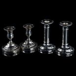 A pair of Edwardian silver plain form table candlesticks, hallmarks Birmingham 1906, height 11.