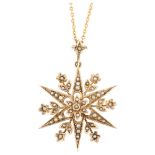 A Victorian 9ct gold split pearl 6-rayed star pendant necklace, on 9ct fine cable link chain,
