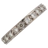A full eternity diamond ring, unmarked white metal settings with modern round brilliant-cut
