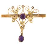 An Art Nouveau 9ct gold amethyst and pearl openwork bar brooch, maker's marks SB and S, bar length