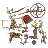 A quantity of watchmaker's bench tools, including lathe, jacot tool etc