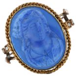 A large Antique composition cameo dress ring, unmarked gold settings with pearl shoulders and