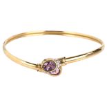 A modern 9ct gold amethyst and diamond torque bracelet, overall setting height 15.3mm, internal