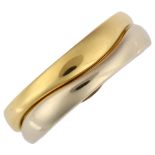 CARTIER - a pair of 18ct yellow and white gold "Love Me" stacking wave band rings, serial no.