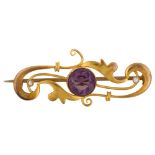 An Art Nouveau amethyst and pearl openwork brooch, unmarked gold settings, brooch length 41.5mm, 2.