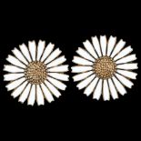 ANTON MICHELSEN - a pair of a Danish vermeil sterling silver and white enamel daisy pattern clip-