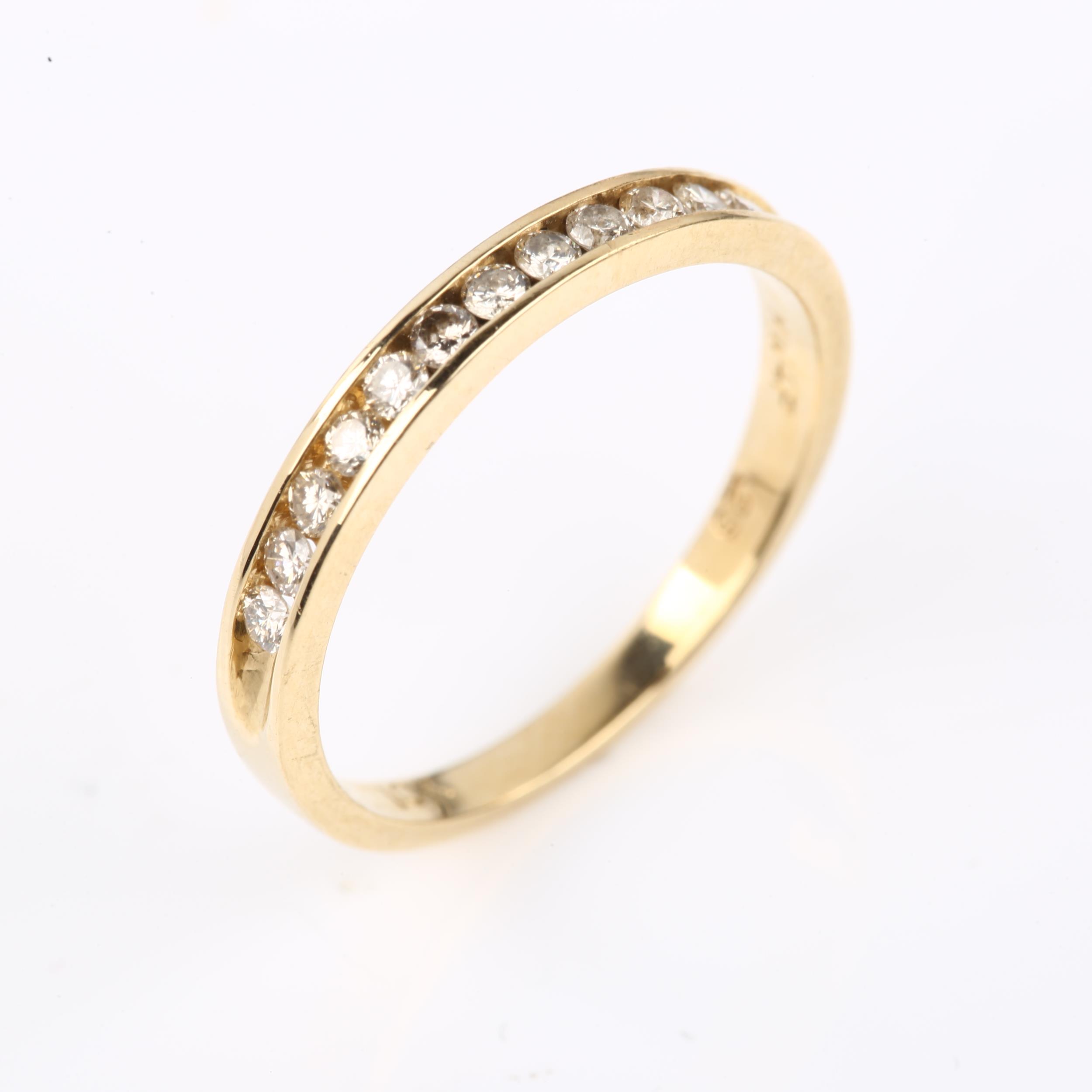 A modern 9ct gold diamond half eternity ring, channel set with modern round brilliant-cut - Image 2 of 4