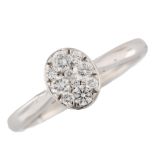 A 9ct white gold diamond cluster ring set with modern round brilliant-cut diamonds, total diamond