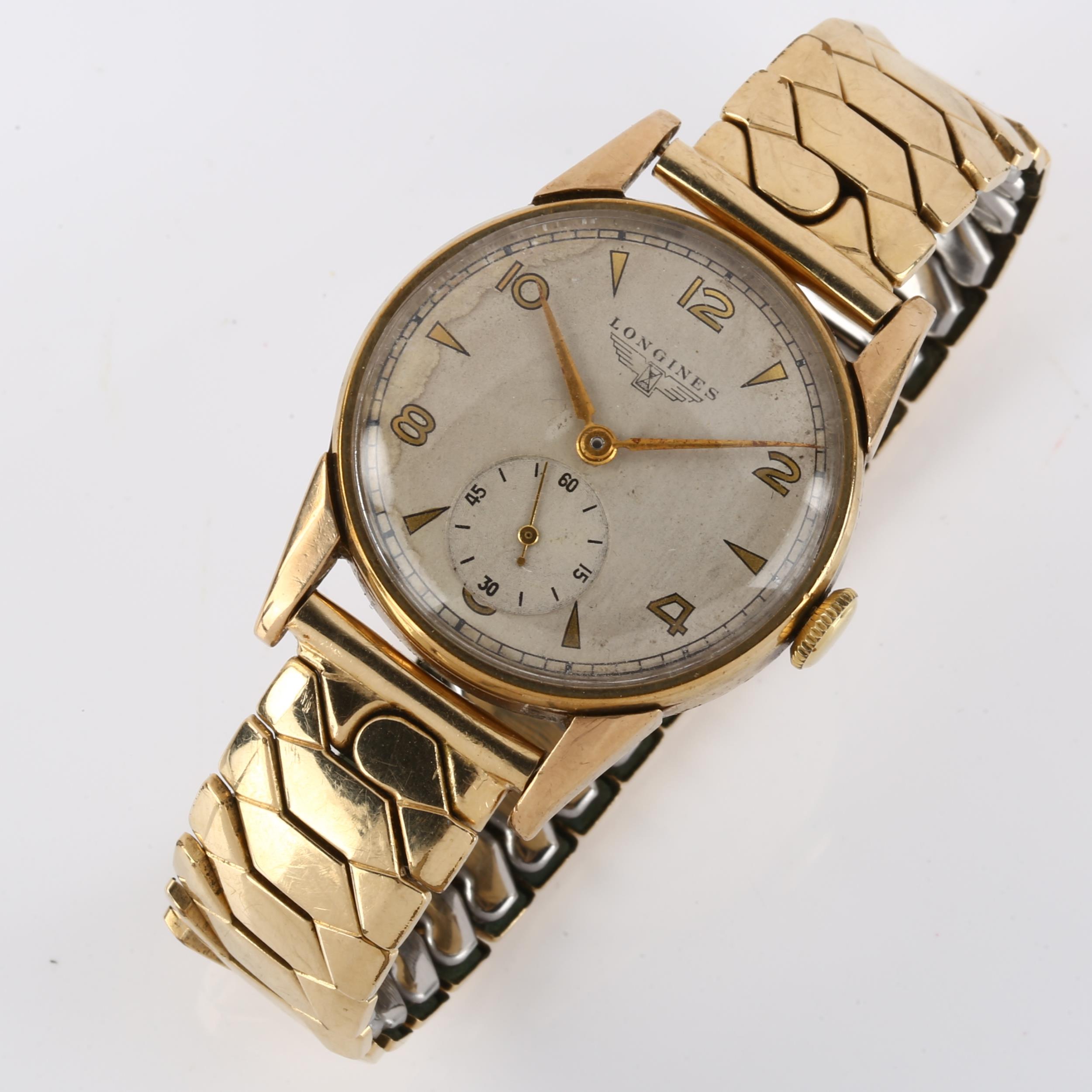 LONGINES - a mid-20th century 9ct gold mechanical bracelet watch, ref. 17702, circa 1948, silvered - Image 2 of 4