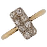 An early 20th century 18ct gold diamond panel dress ring, set with old-cut diamonds, total diamond