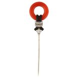 ATTRIBUTED TO CARTIER - an Art Deco coral black enamel and diamond jabot pin, set with polished