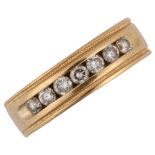 A 14ct gold diamond half eternity ring, channel set with modern round brilliant-cut diamonds,